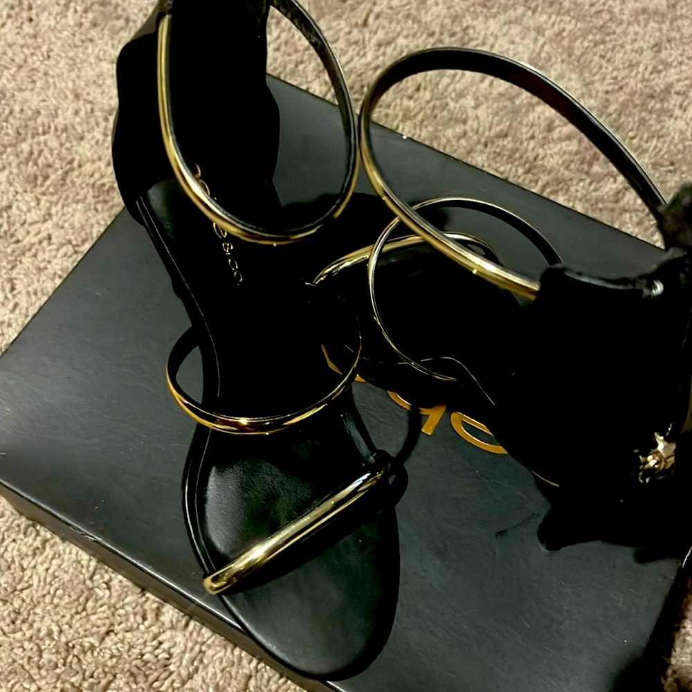 Black open toe gold strap heel